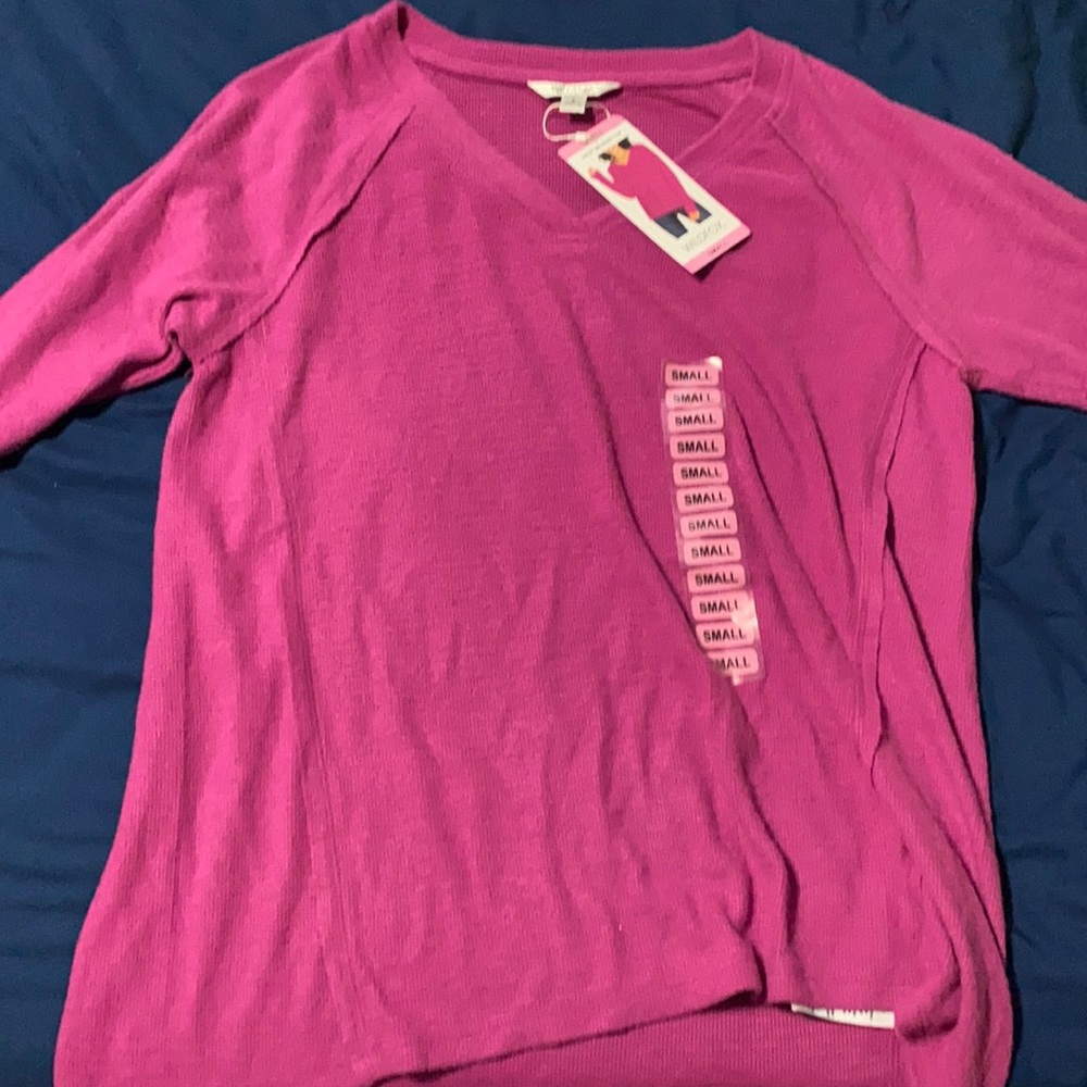 I am selling a long sleeve purple shirt size small